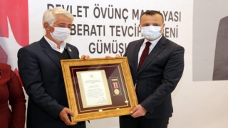 Gümüşhanede Gazi Hasan Turguta devlet övünç madalyası verildi