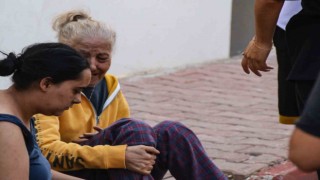 Antalyada 4 katlı dairede yangın paniği, yaşlı kadını kurtaran kurye dumandan etkilendi