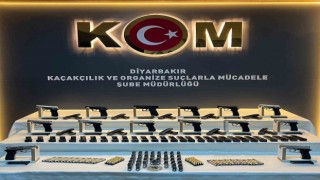 Diyarbakırda salça kovaları içinden 14 adet tabanca ve aparatları ele geçirildi